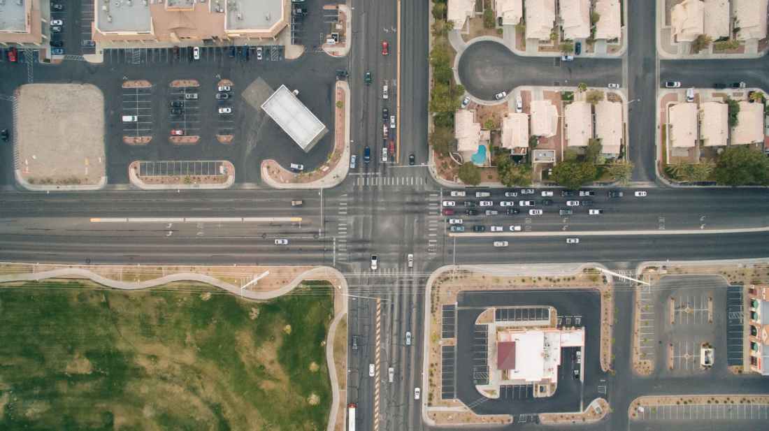 bird s eye view cars crossing crossroad